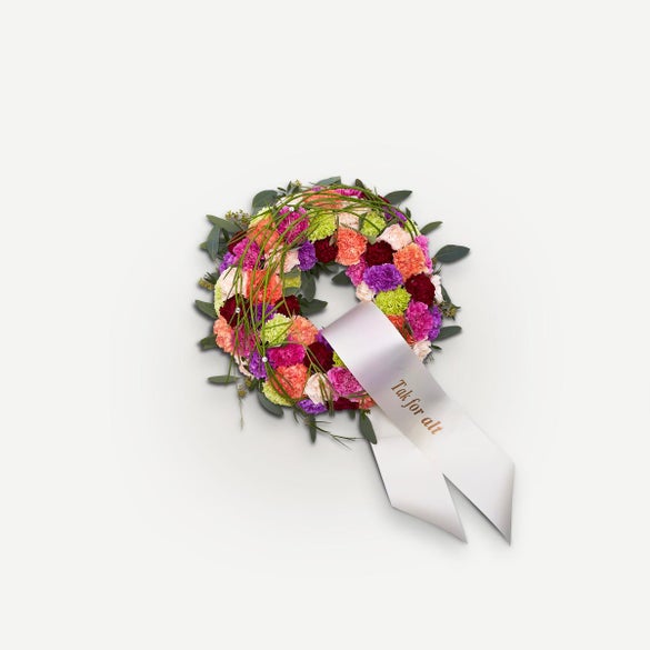 Rundpyntet krans med bånd